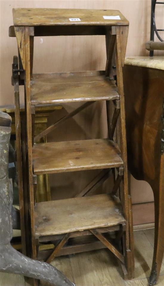 A Victorian patent pine four tread step ladder H.76cm